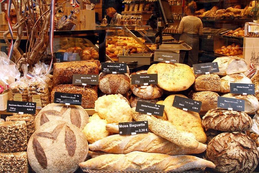 Sunday & Quiet Hours in Germany: The Complete Survival Guide 5 An assortment of freshly baked breads arranged in a bakery display in Aachen, Germany, highlighting their diverse appearances.