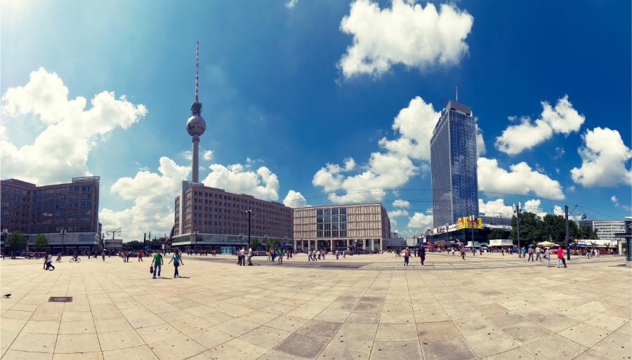 Planning a Trip to Germany: Step-by-Step Guide for First-Timers 6 Sweeping panorama of Berlin Alexanderplatz, highlighting the lively atmosphere and urban landscape of the city square.