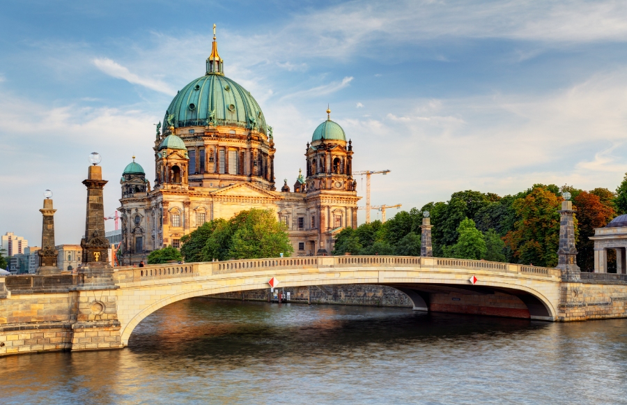 Germany Travel Guide: Ultimate Resource for Destinations, Culture & Tips 34 Berlin Cathedral, a stunning architectural landmark, showcases its grand dome and intricate details against a clear blue sky.