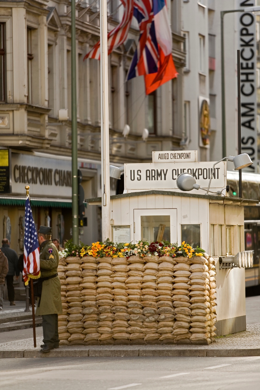 Checkpoint Charlie 2 Close-up of Checkpoint Charlie in Berlin, featuring the iconic guardhouse and historical signage.