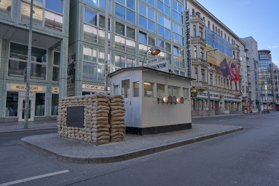Checkpoint Charlie 3 Close-up image of Checkpoint Charlie, highlighting the guardhouse and surrounding area, symbolizing Cold War history.
