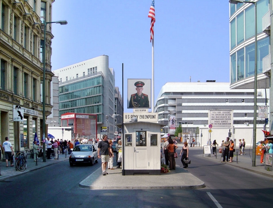 Checkpoint Charlie 6 Close-up of Checkpoint Charlie in Berlin, featuring the iconic guardhouse and historical signage.
