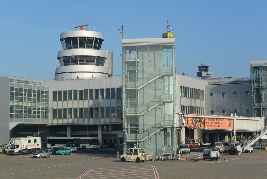 Düsseldorf Airport 18 Exterior view of Düsseldorf Airport showcasing its distinctive tower and modern architecture.