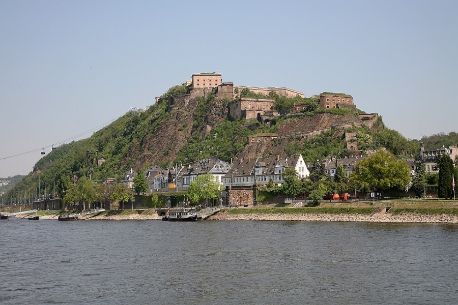 Middle Rhine Valley 13 Aerial view of Ehrenbreitstein Fortress atop a hill, overlooking a river and surrounding landscape.