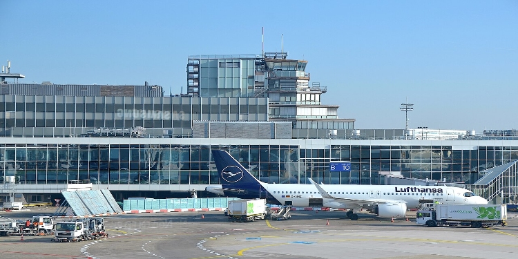 Frankfurt Airport 8 Frankfurt Airport's Gate B10 featuring a large airplane stationed at the terminal, ready for passenger boarding.