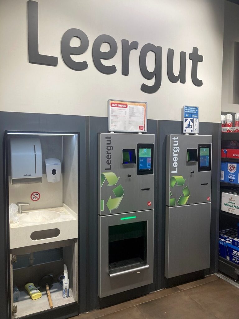 Pfand System Explained: Germany's Bottle Deposit Complete Guide 2 Pfandautomat in Frankfurt, Germany, designed for recycling bottles and cans, featuring a user-friendly interface.