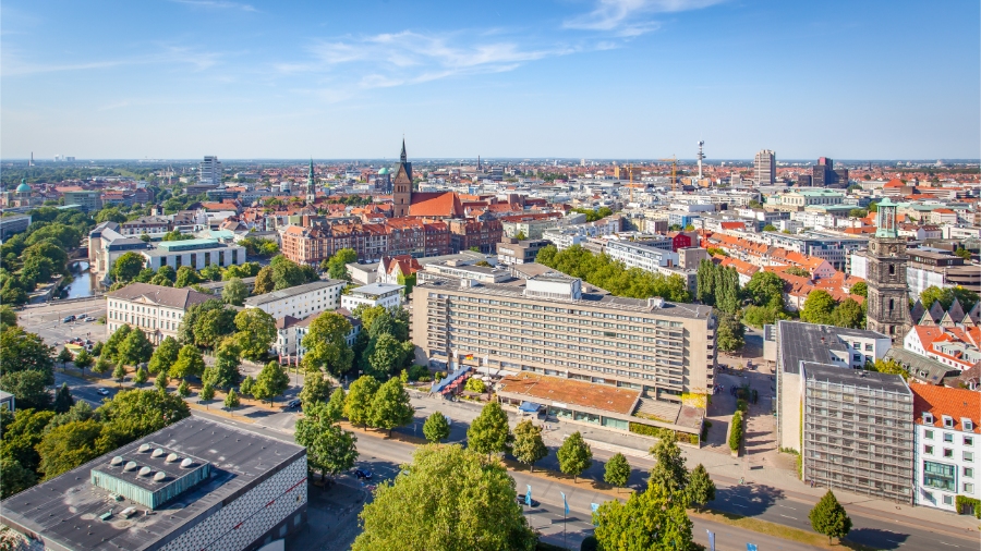 Aerial view of Munich, Germany, showcasing the city's skyline and urban layout from a high perspective.