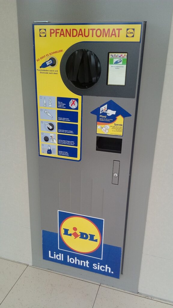 Pfand System Explained: Germany's Bottle Deposit Complete Guide 14 Lidl bottle return machine, featuring a user interface for recycling bottles and cans in a grocery store setting.
