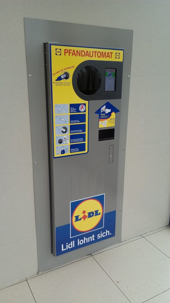 Pfand System Explained: Germany's Bottle Deposit Complete Guide 12 Side view of a Lidl bottle return machine, showcasing its design and user interface for recycling containers.