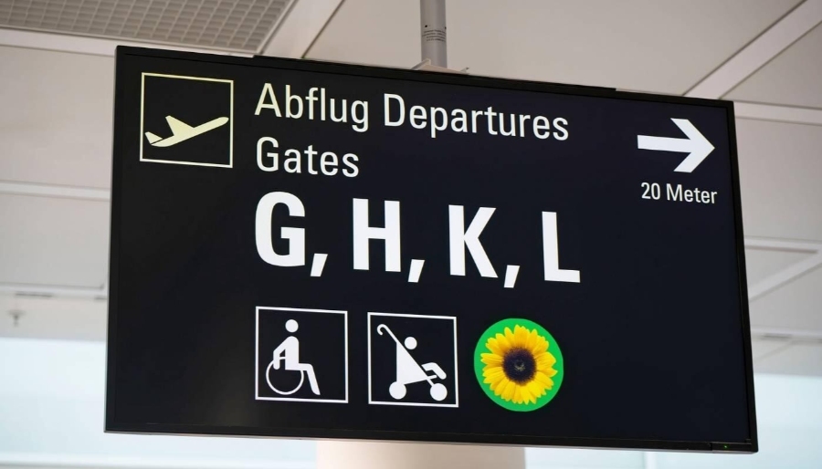 Munich Airport 10 Munich Airport sign featuring the word "airport" and an additional unclear text "ghlkl."