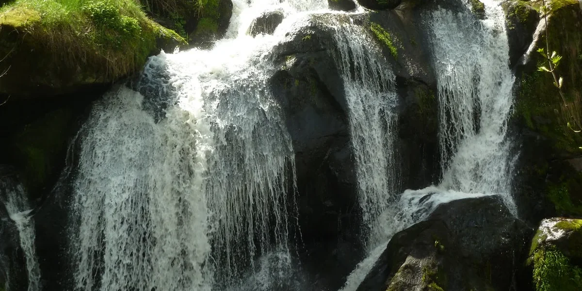 Scenic view and travel landmark guide for Triberg Waterfalls, Germany